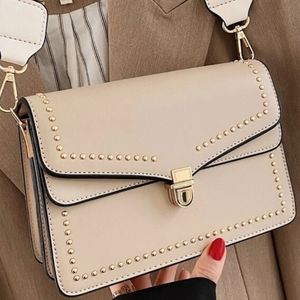 Minimalist studded decor push lock cross body BNWT